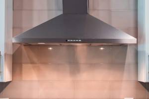 Handyman performing appliance hook-up in Hampton, NH