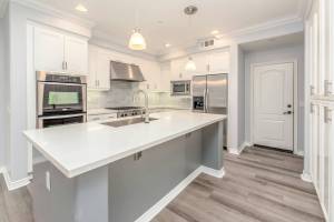 Handyman performing kitchen repair service in Hampton, NH